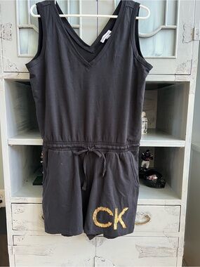 Calvin Klein Black women’s Romper with Gold CK Logo Like New